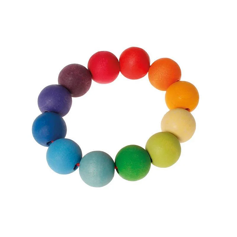 Grimm's grasping bead ring toy
